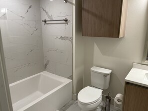 Hair dryer, towels, soap, toilet paper
