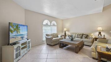 House, Multiple Beds, Patio, Pool View | Living area | TV
