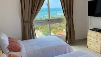 2 bedrooms, desk, iron/ironing board, travel crib