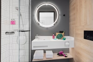 Shower, hair dryer, towels, soap