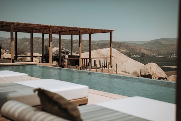 Outdoor pool, open 9:00 AM to 9:00 PM, sun loungers