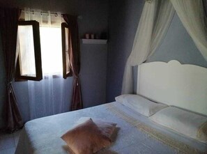 1 habitación y ropa de cama 