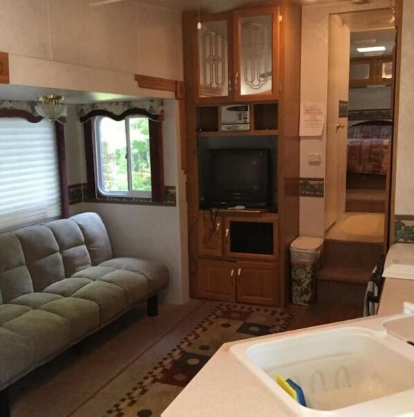 Living area - Riverfront RV site at Pinegrovecamp.com (Medway)