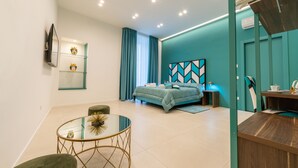 Deluxe suite | 1 slaapkamer, een minibar, een bureau, geluiddichte muren