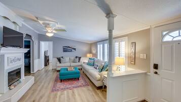 Télévision, cheminée, baby-foot