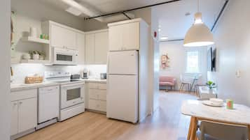 Luxury Apartment | Private kitchen | Full-size fridge, microwave, oven, stovetop