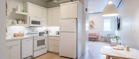 Luxury Apartment | Private kitchen | Full-size fridge, microwave, oven, stovetop