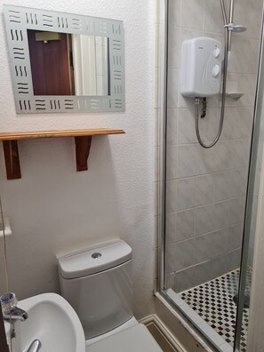 Shower, towels, soap, shampoo