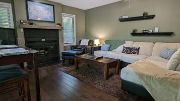 Smart TV, fireplace, DVD player, books