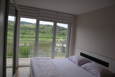 Enjoy nature and village life in a spacious modern villa.