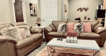 Cozy 2 bedroom basement with 2 beds, kitchen, 75’’ TV and bathroom