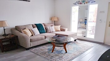 City House | Living area | 32-inch TV with cable channels