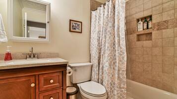Traditional House | Bathroom | Towels, soap, shampoo, toilet paper