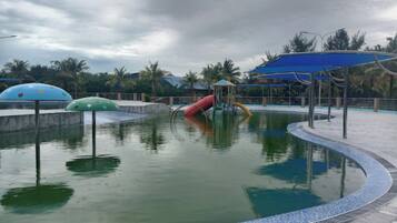 Outdoor pool, open 6:00 AM to 8:00 PM, lifeguards on site