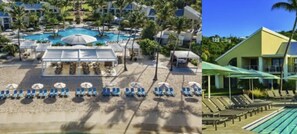 A resort with a large pool, sun loungers, and a covered area.
