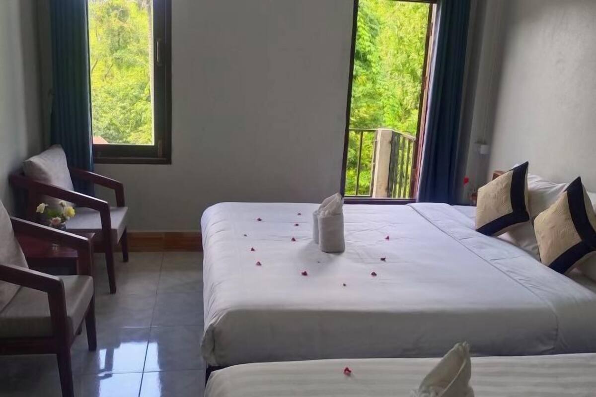 Premium bedding, desk, laptop workspace, free WiFi