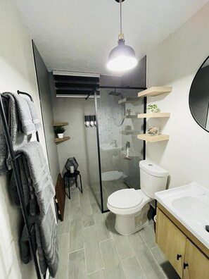 Shower, towels, soap, shampoo