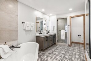 Bathtub, hair dryer, towels