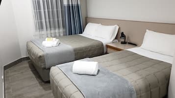 Standard Room, Multiple Beds | Desk, laptop workspace, iron/ironing board, free WiFi