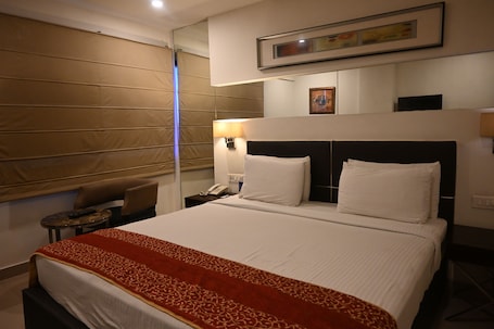 1 habitación, sistema de insonorización y tabla de planchar con plancha