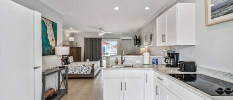 Fridge, microwave, stovetop, coffee/tea maker