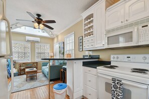 Fridge, microwave, stovetop, coffee/tea maker