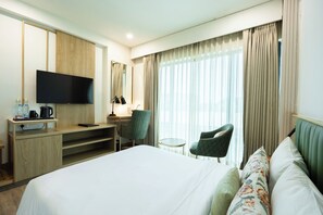 Ropa de cama de alta calidad, minibar y escritorio