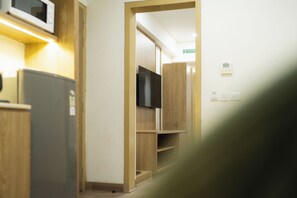 Executive Suite | Seprai premium, minibar, meja kerja, dan ruang kerja ramah laptop