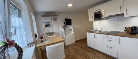 Microwave, stovetop, dishwasher, coffee/tea maker