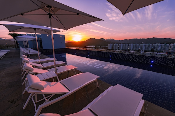 Indoor pool, seasonal outdoor pool, cabanas (surcharge), pool umbrellas