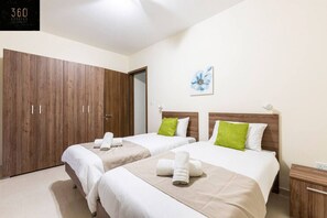 2 bedrooms, desk, iron/ironing board, travel cot