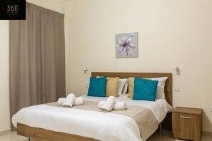 Desk, iron/ironing board, travel cot, free WiFi