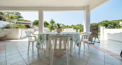 Casa de vacaciones 'Cala Lunga' con terraza privada y jardín privado