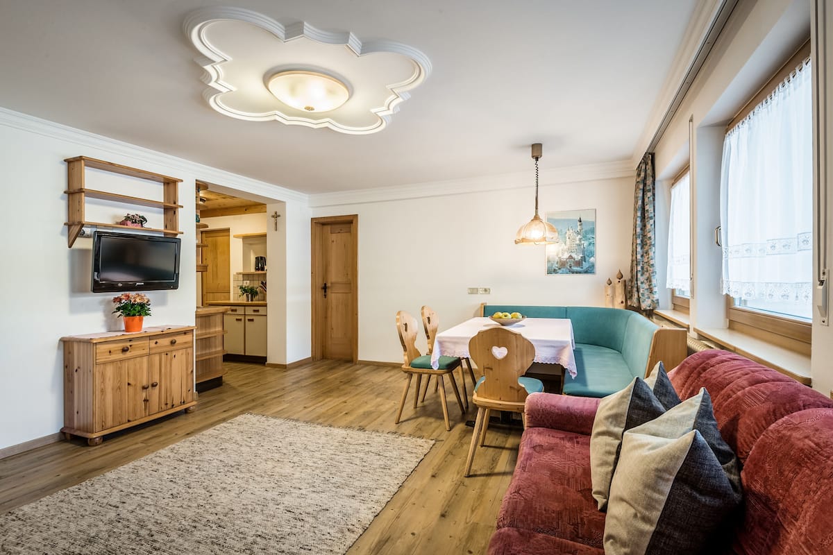 Familienapartment | Wohnbereich | Flachbildfernseher