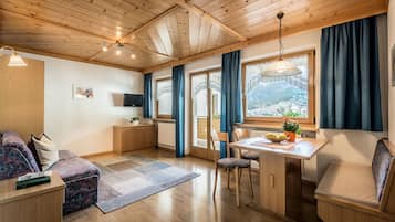 Comfort Apartment, 1 Queen Bed with Sofa bed | Living area | Flat-screen TV