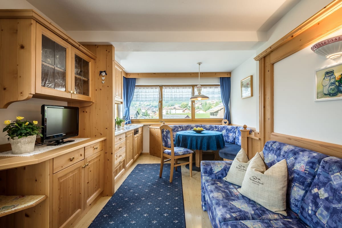 Exclusive-Apartment | Wohnbereich | Flachbildfernseher