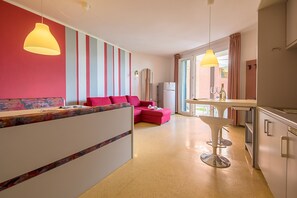 Basic Apartment | Living area | 35-inch TV with digital channels