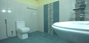 Shower, rainfall showerhead, towels, soap