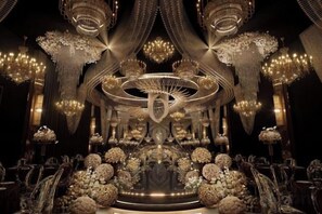 An opulent interior with chandeliers, ornate decorations, and a central circular structure. - Venus Resort (Yidu)