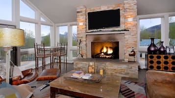 Télévision, cheminée, espaces bureaux