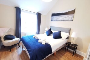 2 bedrooms, desk, iron/ironing board, travel crib