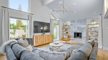 TV, fireplace, books, offices