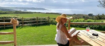 Sustainable Coastal Retreat: Luxury Glamping Safari Tent - Sleeps 6!