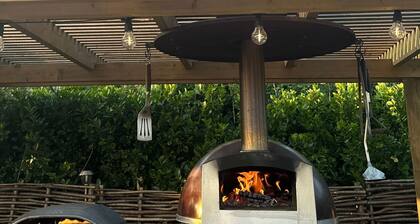 Sustainable Coastal Retreat: Luxury Glamping Safari Tent - Sleeps 6!