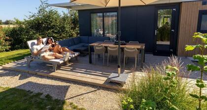 Stay in the modern and spacious Zonnweelde Lodge and be on the beach in no time