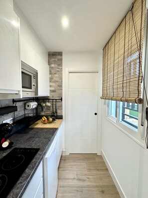EstĂșdio urbano | Cozinha privada | Frigobar, micro-ondas, cooktop, cafeteira/chaleira