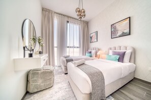 2 chambres, coffres-forts dans les chambres, fer et planche à repasser