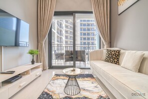 TV - Modern 1BR at DAMAC Zada Tower Business Bay by Deluxe Holiday Homes (Dubai)