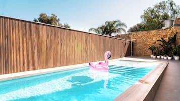 Outdoor pool, open 8:00 AM to 8:00 PM, sun loungers