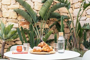 Outdoor pool, open 8:00 AM to 8:00 PM, sun loungers